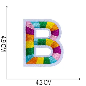 Close-up detail of a colorful embroidered letter B patch with 4.9 x 4.3 cm dimensions