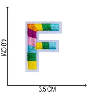 Detailed view of a colorful embroidered letter F patch with specific size dimensions
