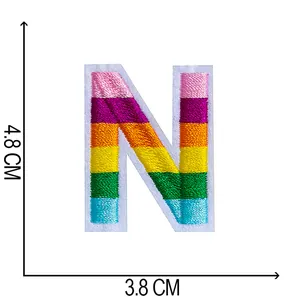 Detailed dimension view of rainbow embroidered letter N patch, 4.8 x 3.8 cm