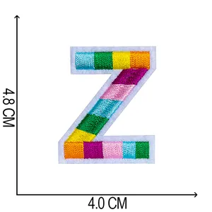 Detail view of rainbow embroidered letter Z patch showing 4.8cm by 4.0cm dimensions