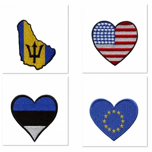 Close-up showing various 2.5-inch heart and map national flag embroidered iron-on patches