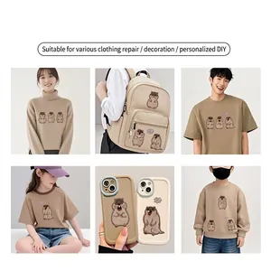 Cute cartoon marmot embroidery patches shown on clothing and accessories