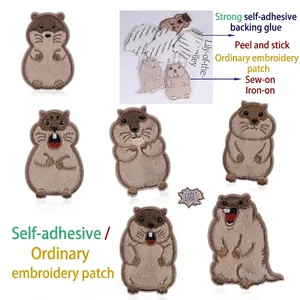 Detail showing various cute groundhog embroidered patches with adhesive and sew-on options