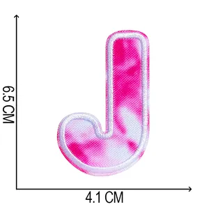 Close-up of pink tie-dye embroidered letter J patch for clothing, size 6.5 x 4.1 cm