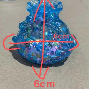 Blue transparent money bag squishy stress relief toy with colorful sequins 6cm size