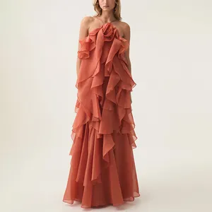 Full view of an elegant terracotta layered ruffle halter maxi dress for modern women