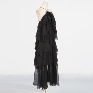 Elegant black halter neck maxi dress with tiered ruffle detailing and backless design