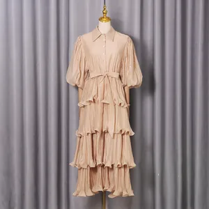 Elegant beige pleated tiered dress with rhinestone puff sleeves and a waist tie.