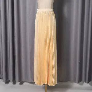 Detailed view of the pleated fabric texture on this elegant high-waisted maxi skirt.