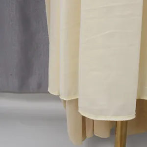 Close-up view showing the delicate hemline and fabric texture of French elegant maxi dress