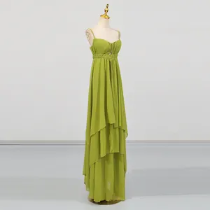 Elegant lime green tiered maxi dress featuring spaghetti straps and irregular layered hemline.