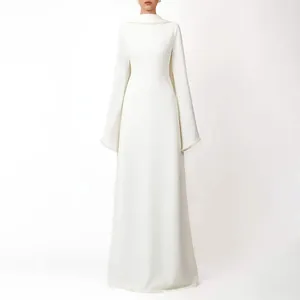 Detail view of elegant white French-style gown with cape sleeves and pearl trim
