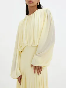 Elegant French style pale yellow pleated maxi dress with long sleeves and cinched waist