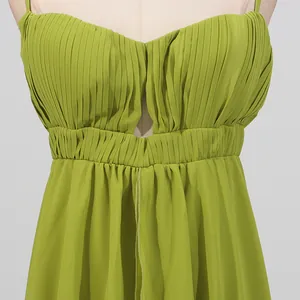 Close-up of the elegant pleated lime green bodice on a stylish vacation maxi dress