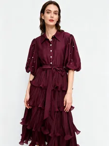 French style burgundy tiered pleated dress with puff sleeves and jewel buttons
