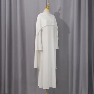 Elegant detailed view of white French style formal dress with a beaded cape design.
