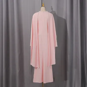 Detailed back view of a pink French style maxi dress featuring pearl trim and cape design