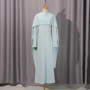Elegant light blue long maxi dress featuring unique cape design and delicate beaded edges