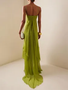 Back view of elegant lime green holiday maxi dress with flowing ruffled layers