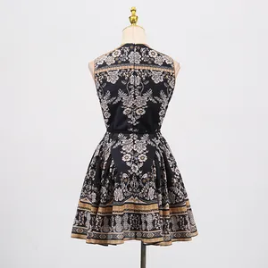 Back view of a French retro sleeveless printed mini dress on a torso mannequin.