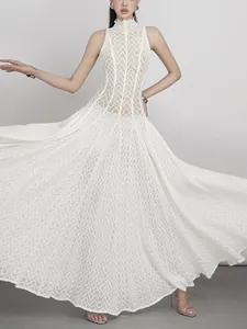 Elegant white lace sleeveless long dress with high collar and flared skirt design