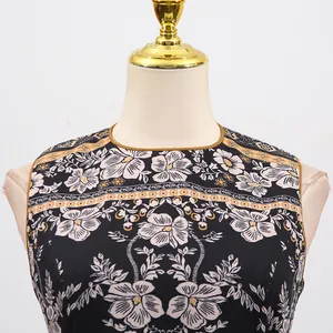 Detailed view of the round neck and elegant floral print on French vintage sleeveless dress