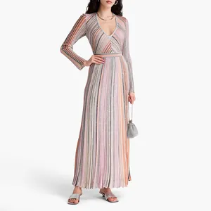 Full view of elegant knit maxi dress with colorful stripes and deep V-neck.