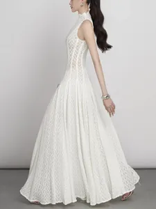 Elegant white vintage lace maxi dress with high neck trim and slim fit silhouette