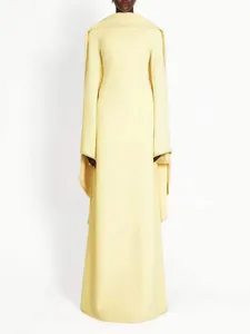 Elegant pale yellow French style formal dress featuring long sleeves and a cape design.