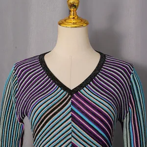 Detailed view of elegant V-neck striped knit dress featuring colorful vertical patterns