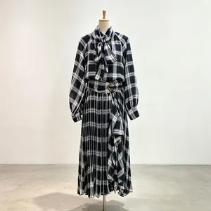 Elegant plaid two-piece set featuring lace-up bow top and high-waist pleated maxi skirt