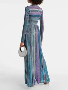 Elegant long-sleeved knitted maxi dress with colorful vertical stripes and high waist