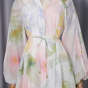 Close-up of floral print long dress with sweet V-neck and puff sleeve design
