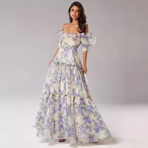 Romantic vintage off-shoulder floral maxi dress with corset waist and puff sleeves
