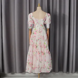 Elegant floral print maxi dress featuring a vintage corset back and puff sleeves detail.