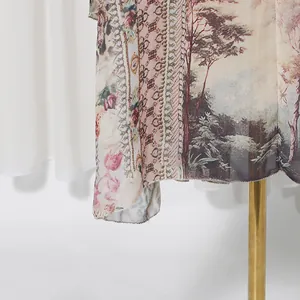 Detailed view of the French style vintage floral print on elegant long dress fabric