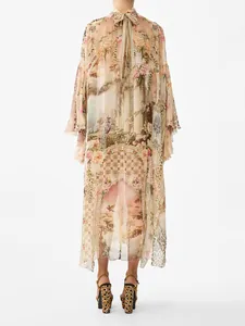 Elegant French palace style printed long dress with high neck tie and leopard print.