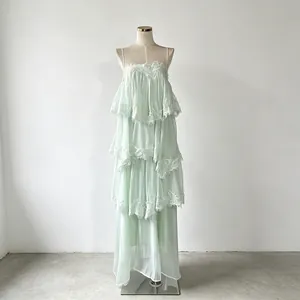 Mint green tiered lace long dress with delicate ruffles and thin spaghetti straps
