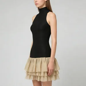 French style sleeveless mini dress with black turtleneck top and beige ruffled skirt.