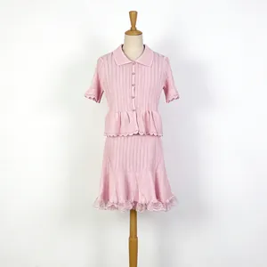 French sweet style pink knit set with POLO collar top and lace trim A-line skirt on mannequin
