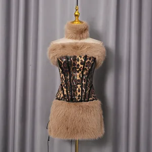 Close-up detail of leopard print sequin corset with luxurious beige faux fur trim.