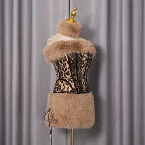 Detailed macro view of leopard print sequin corset with luxurious brown faux fur trim