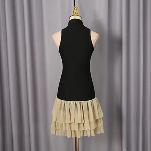 Back view of elegant sleeveless mini dress with tiered ruffle skirt and stand collar
