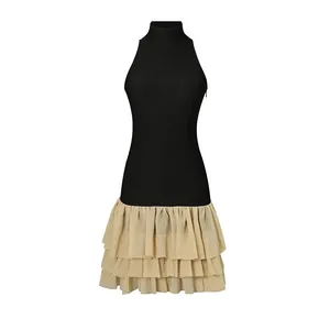 French-style color-block sleeveless dress with high neck and tiered ruffled skirt