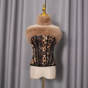 Detail view of stylish leopard print sequin corset top with faux fur trim for women