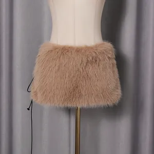 Close-up showing the soft texture of a brown faux fur bandeau top on a mannequin.