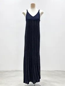 Navy blue pleated camisole dress with vertical silver stripes and elegant V-neckline