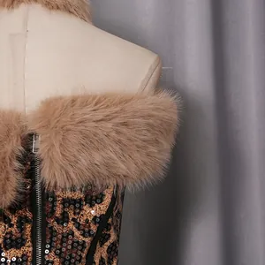 Detailed macro view of a leopard print sequin top featuring a plush faux fur neckline.
