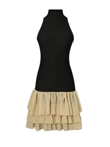 Elegant French style sleeveless mock neck dress with a tiered ruffle skirt contrast design