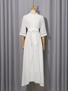 Elegant French retro white long dress with hollow lace detailing and a bow-tied waist belt
